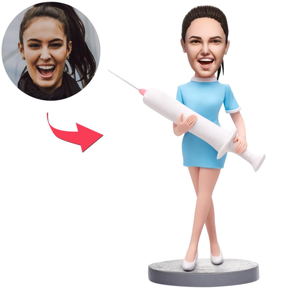 Personalisierte Wackelkopf Figur – Krankenschwester in blauer Kleidung – mit Wunschgravur.