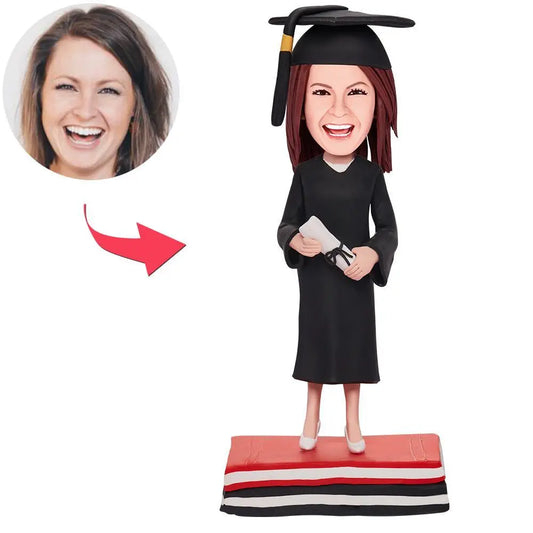 Personalisierte Wackelkopf Figur – Absolventin mit Wunschgravur.